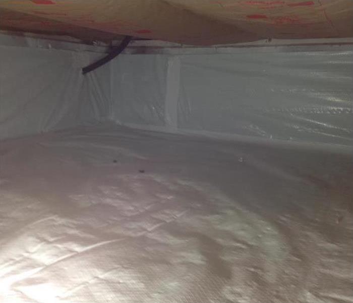 Odor Barrier Placed in Crawl Space