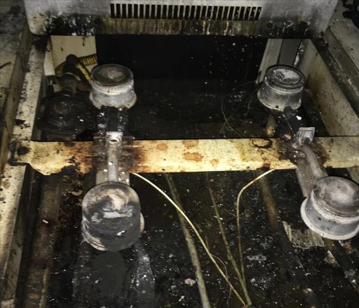 Kitchen Stove After Fire
